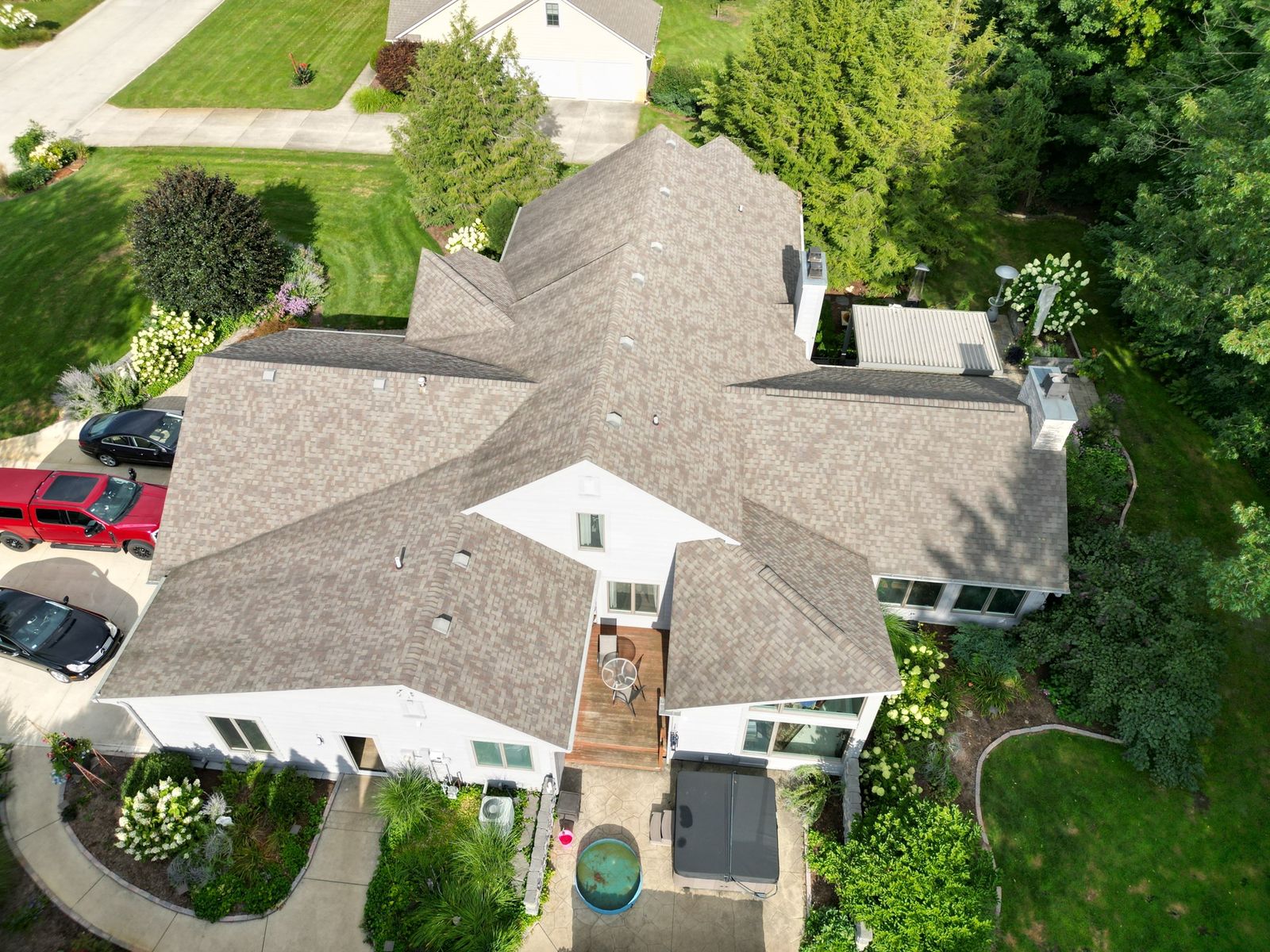 Weathered wood asphalt shingle roof replacement on a large Northeast Indiana home